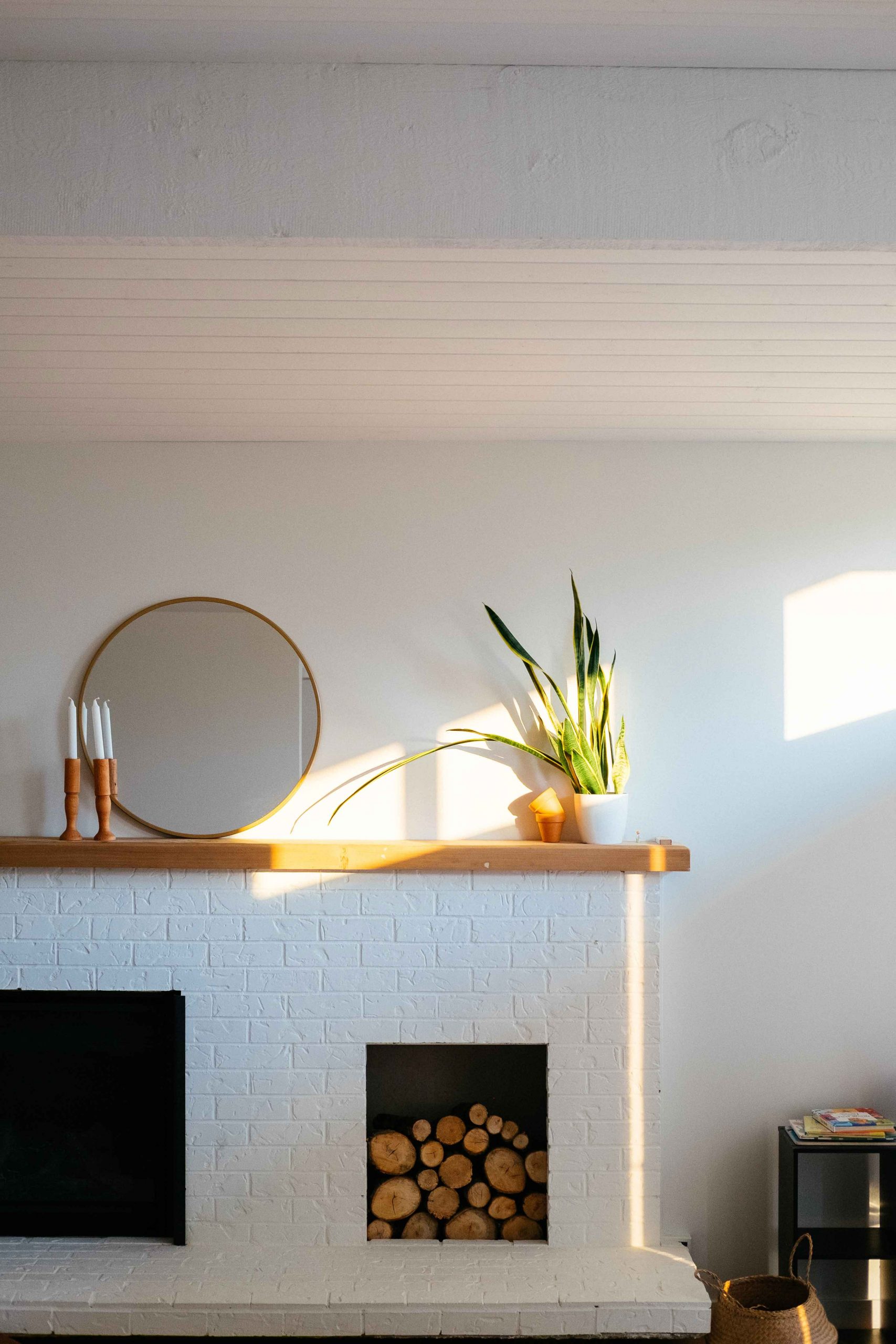 how to hang a mirror over a fireplace