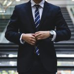 A professional lawyer in a suit standing confidently, representing legal experts who can answer the question: What Can Employment Solicitors in Cardiff Do for You? Whether you need support with unfair dismissal, redundancy, or workplace disputes, expert solicitors provide the guidance you need.